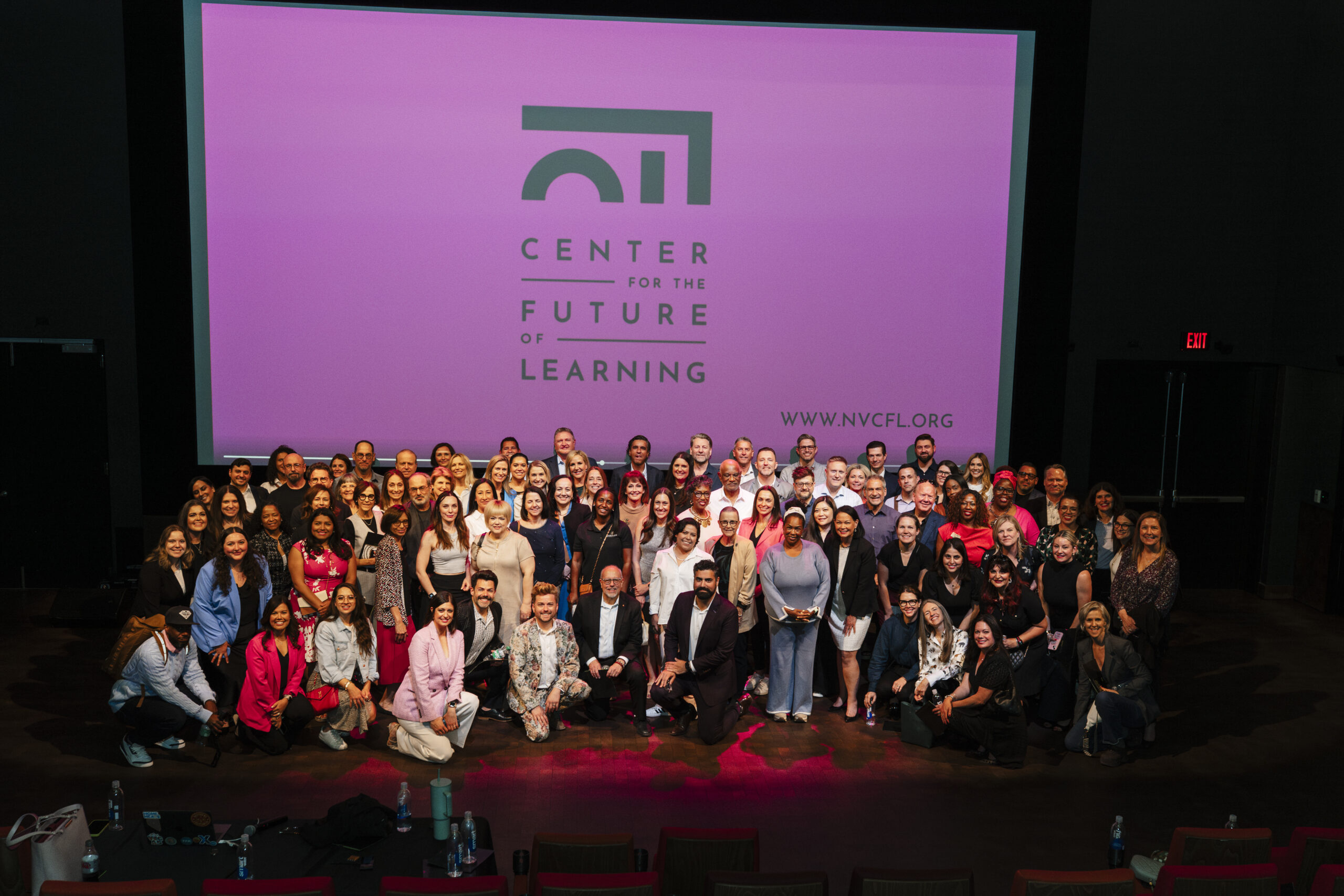 Group Photo of attendees post keynote speaker during a launch party for non-profit