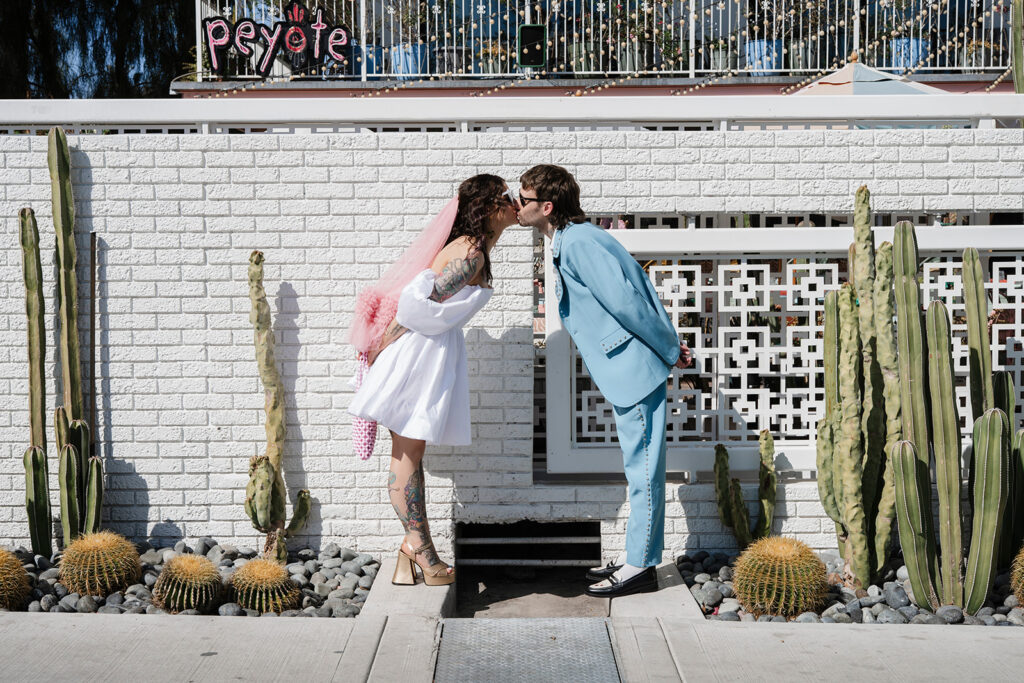 Bride and groom kissing in Downtown Las VEgas