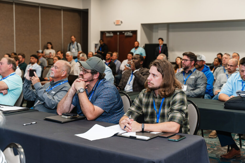 Association event photography captures attendees listening attentively during an afternoon educational session at an association conference, highlighting member engagement and professional learning.