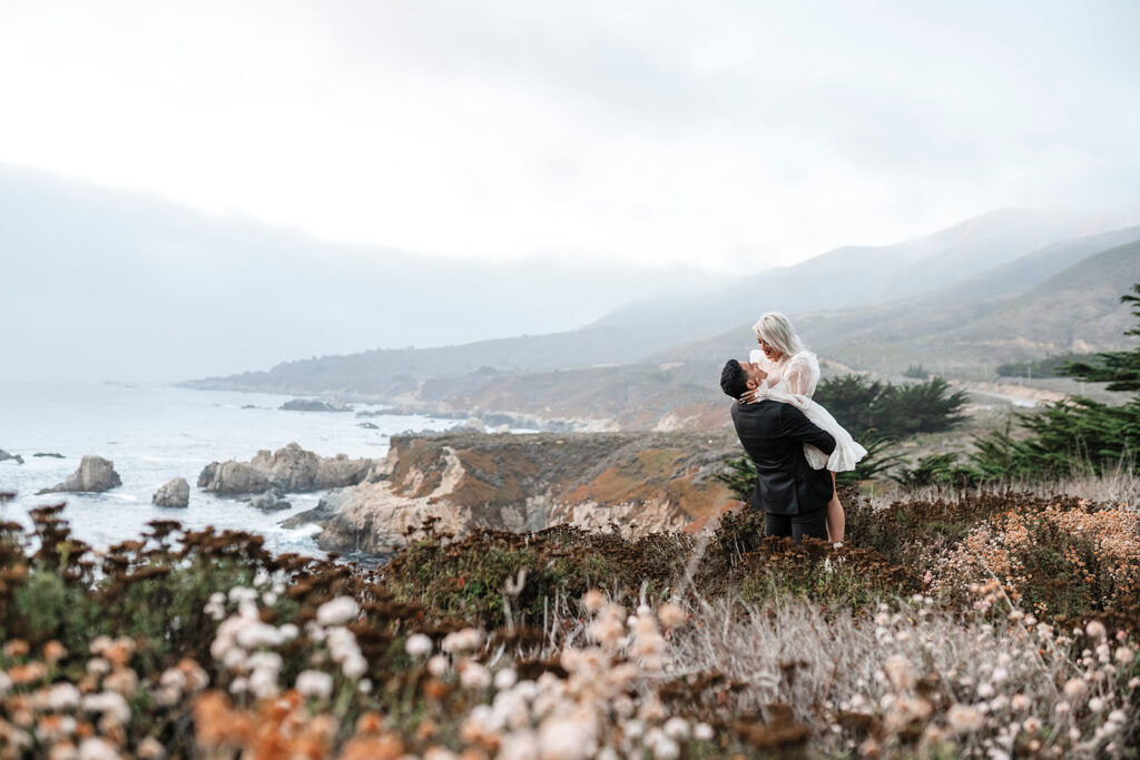 Married couple along California Big Coast taking their wedding portraits