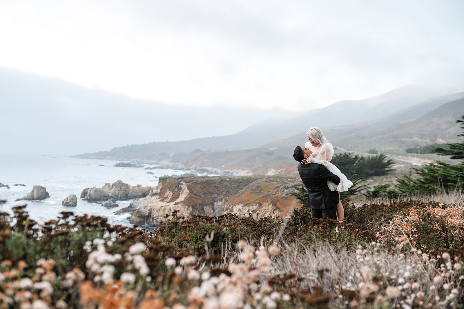 Married couple along California Big Coast taking their wedding portraits