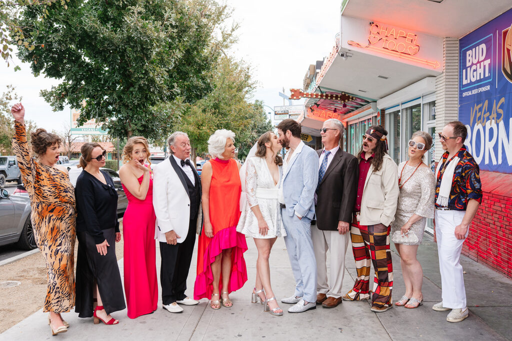 Family Photos outside Sure Thing Chapel before the ceremony, emphasizing shared anticipation and multi-generational presence in a traditional wedding format.