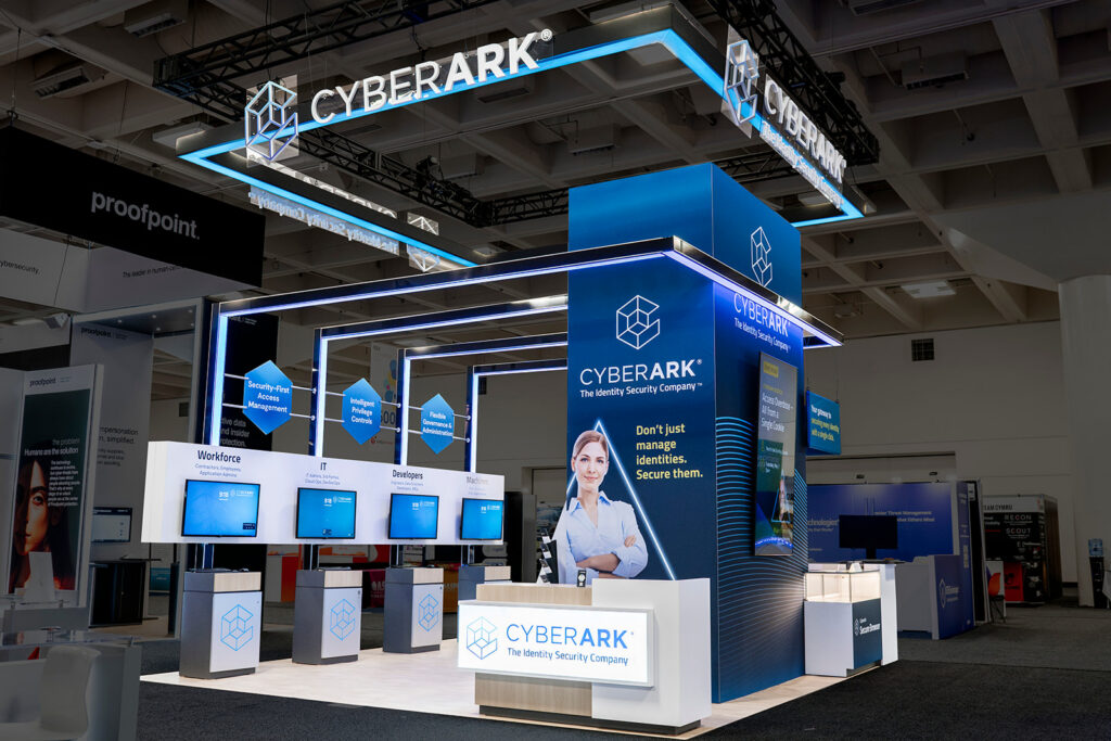 Exhibit photography photo taken for side-by-side comparison of final booth build to design rendering.